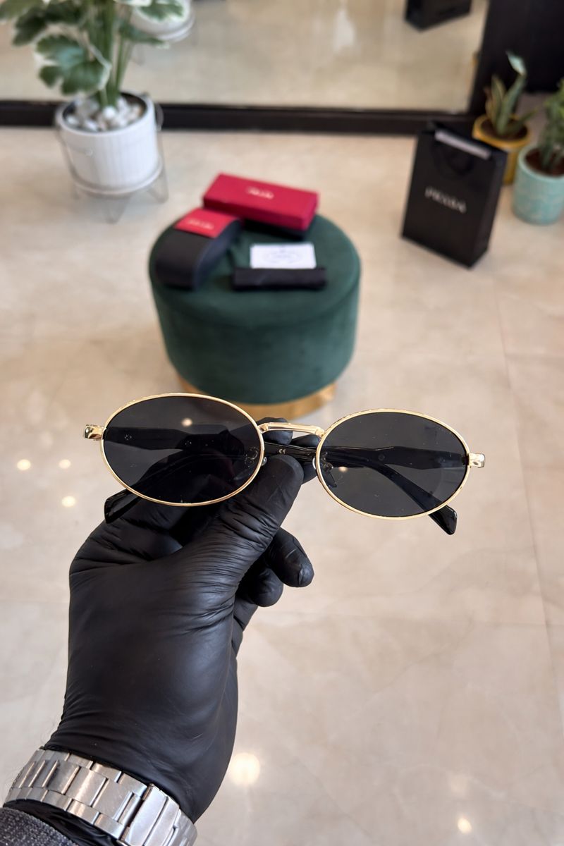 Luxury Oval Sunglasses – Black Lens Gold Frame Luxury oval sunglasses with black lens and gold frame