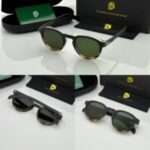 Green lens full-frame sunglasses with stylish UV protection design