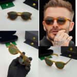 Stylish green lens eyewear with brown frame