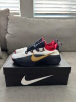 Nike white navy gold basketball shoes back view