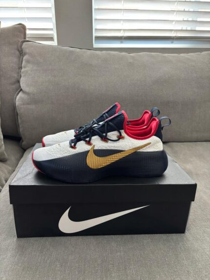 Nike white navy gold basketball shoes back view