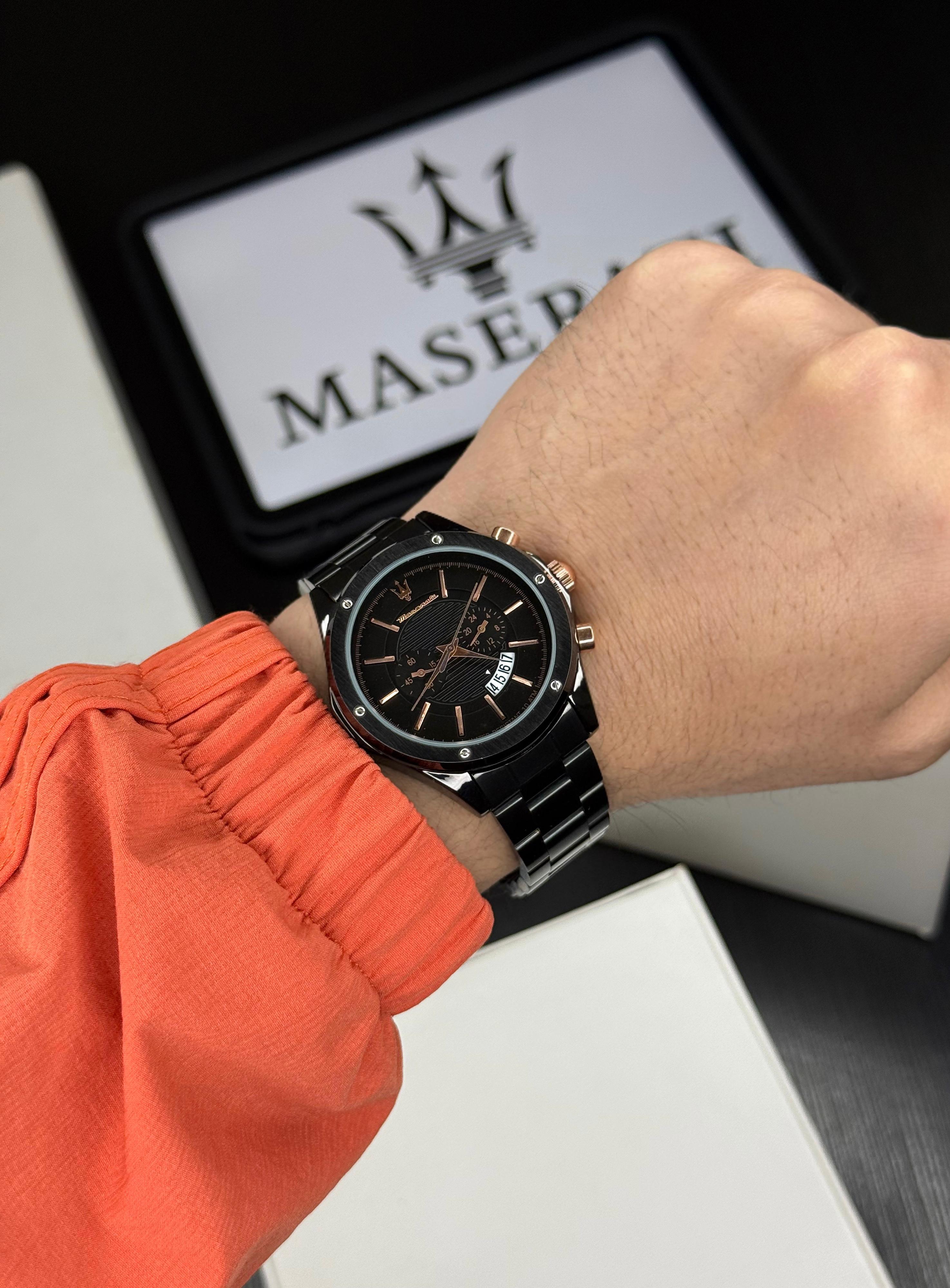 Maserati black chronograph watch dial close up