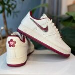 Nike Air Force 1 White & Maroon front view low top sneakers
