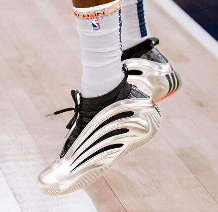 Metallic silver basketball shoes for men on court