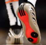 Metallic silver basketball shoes outsole grip detail