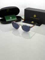 Grey frame sunglasses with blue tinted lenses