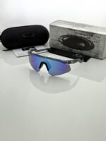 Side profile of grey and aqua optical glasses frame