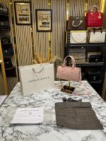 Charles & Keith Kerry Mini Tote Bag (White) – Elegant Designer Mini Handbag with Carry Bag.