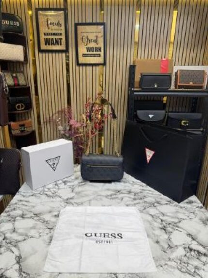 Guess Noelle Crossbody Camera Bag With Box, Dust Bag & Carry Bag (Grey Black) – Premium Designer Sling Bag for Women.