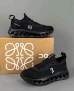 Modern all black sport sneakers rubber outsole