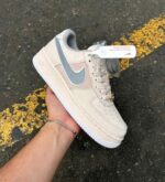 Cushioned sole beige lifestyle sneakers close view