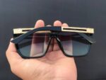 Black dark lens sunglasses for travel and city look