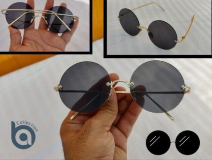 Black round frame sunglasses with dark tinted lenses