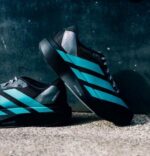 Black teal athletic running shoes modern design