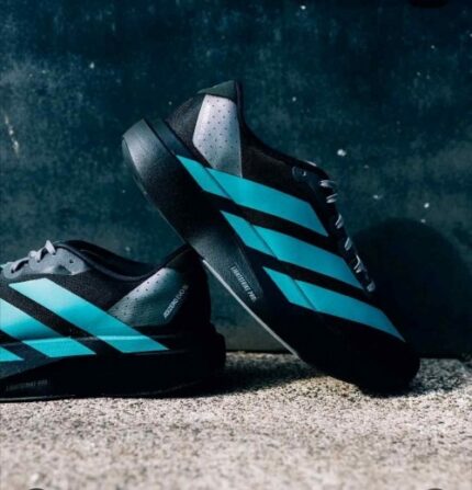 Black teal athletic running shoes modern design