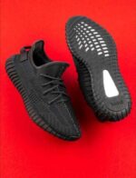 Cushioned sole black performance sneakers design