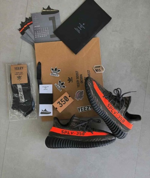 Carbon grey orange stripe knit running sneakers side view (5) Flexible knit upper grey running shoes rubber sole