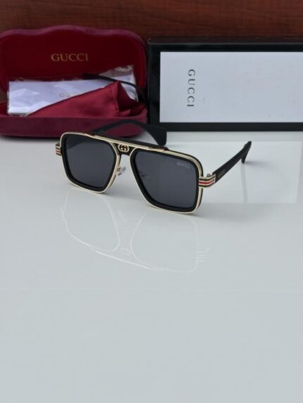 Golden black frame sunglasses with black gradient lenses