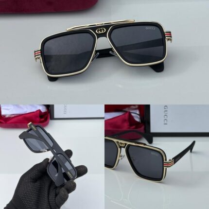 Black gradient lens outdoor eyewear with gold accents