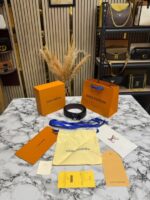 Louis Vuitton Black Leather Belt with Silver LV Buckle