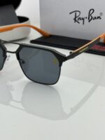 Orange frame sunglasses on white background