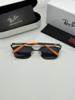 Modern orange black glasses side view