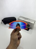Modern sports sunglasses orange blue color
