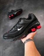 Breathable mesh gym sneakers black red colorway