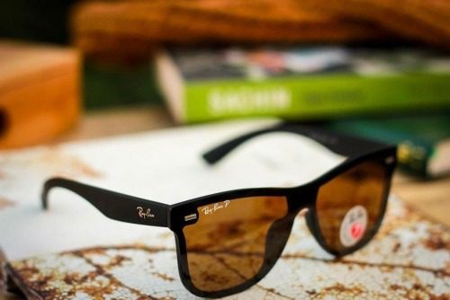 Stylish Black Frame Sunglasses – Lightweight UV Protection Shades (2) Stylish black fashion sunglasses with clear lenses