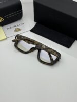 Modern military green eyeglasses on white