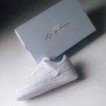 Breathable perforated white leather casual shoes