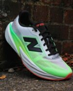 Lightweight cushioned road running sneakers white green