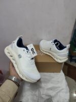 White navy lightweight performance running sneakers side view