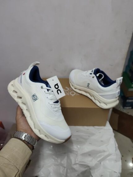 White navy lightweight performance running sneakers side view