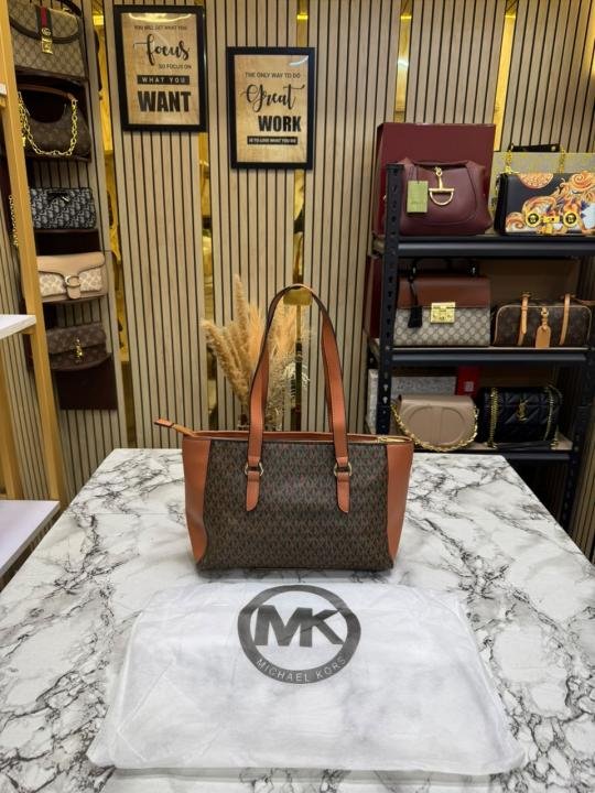 Buy Michael Kors Signature MK Tote Handbag With Tassel Charm And Dust Bag Online in India - Style 3 - Bootery - Image 5