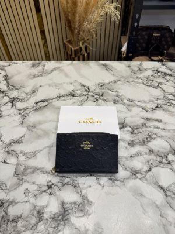 3194935_6a44bbee5ac410.jpg Coach Embossed Signature Zip-around Mini Wallet With Box - Image 1