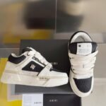 Amiri MA-1 sneakers in a white and black Shoes - Best Price Online - Bootery