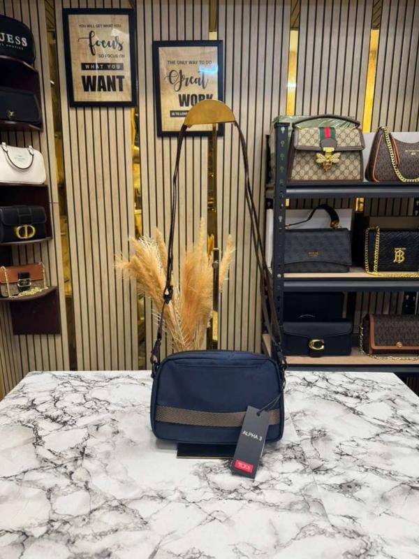 Tumi Fremont Trousse Dark Opal Crossbody Bag - Image 4