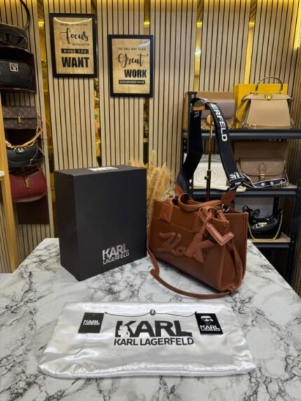 Buy Karl Lagerfeld Kskuare Embossed Hand Bag Brown Online in India - Bootery